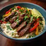 Creamy Queso Rice with Juicy Steak Strips